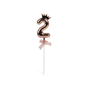 Number 2 on a stick with a rose gold crown